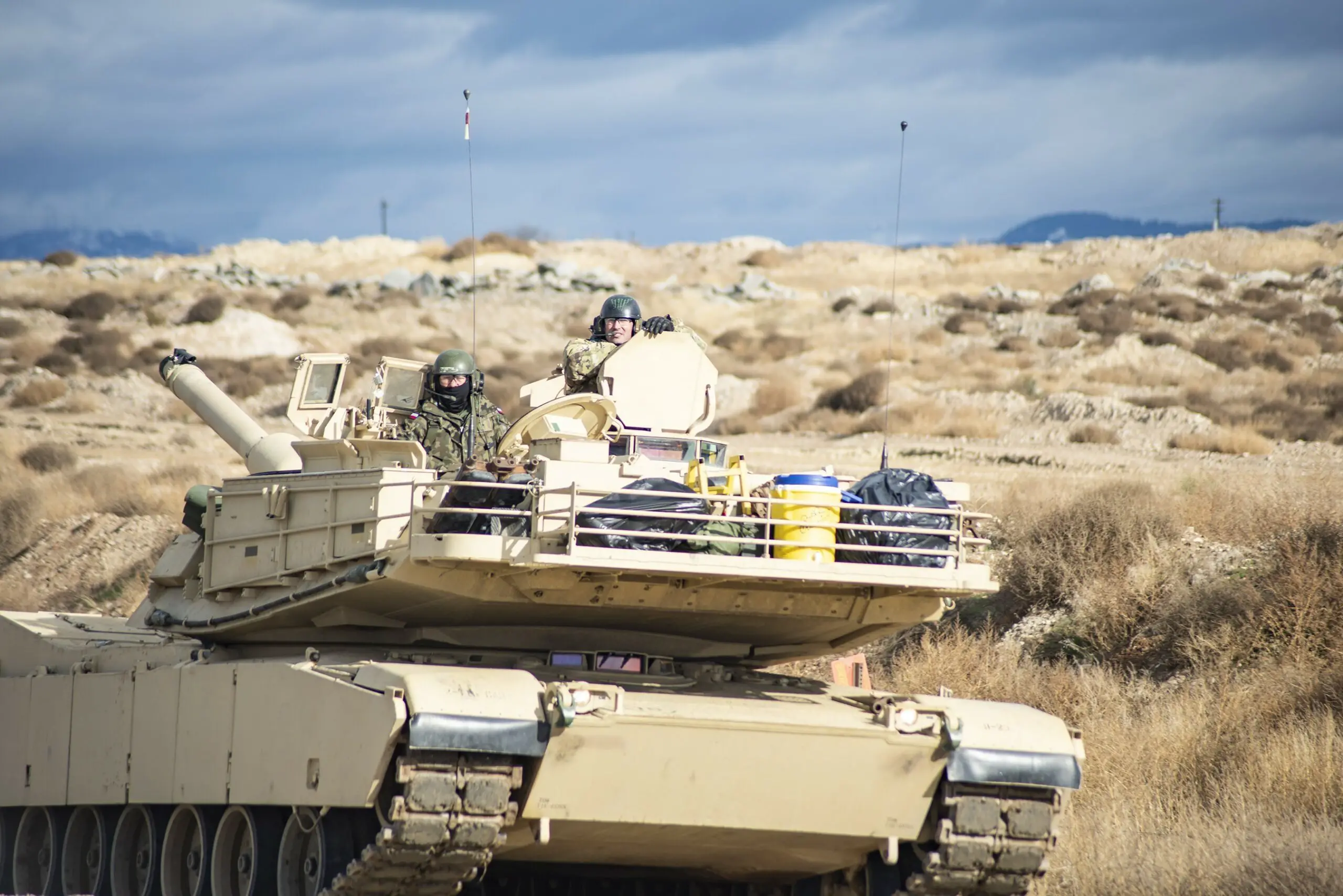 Polish soldier and Idaho National Guard M1 Abrams tank training