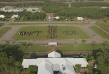 20050408adf8266562_0014.JPG Caption: Deep Caption: Soldiers and their vehicles of the Al Muthanna Task Group (AMTG) parade for the Commander of the 1st Brigade, Brigadier John Cantwell, at Robertson Barracks in Darwin following the completion of their Mission Rehearsal Exercise. The solders are being farewelled prior to their deployment to southeast Iraq, surrounded by their families and fellow members of the 1st Brigade.