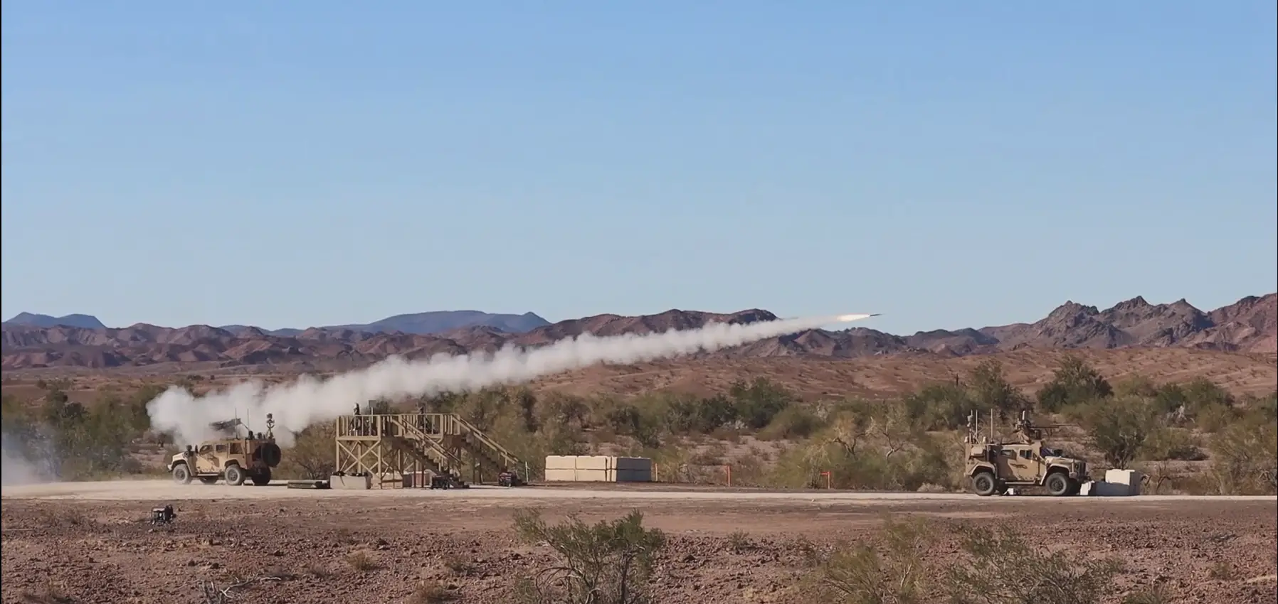 Yuma Proving Ground, Arizona - U.S. Marines with Marine Corps Systems Command, fire a Stinger Missile from a Marine Air Defense Integrated System (MADIS) at Yuma Proving Ground, Arizona, December 13, 2023. The MADIS Mk1, pictured, and Mk2 form a complementary pair and will be the basic building block of the Low Altitude Air Defense (LAAD) Battalions’ ground-based air defense capability. (U.S. Marine Corps photo by Virginia Guffey)