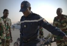 Senegal Air Force Medic carries a litter with a patient on it during an exercise scenario of Aeromedical Evacuation Team Phase V at Ouakam Air Base, Senegal, Jan. 24, 2024. The completion of Phase V of the AMET training signifies a remarkable journey for the Senegalese Air Force which has been actively involved in Aerial Patient Movement in collaboration with USAFE-AFAFRICA Surgeon General Office and Defense Institute for Military Operations since 2019. (U.S. Air Force photo by Dreshawn Murray)