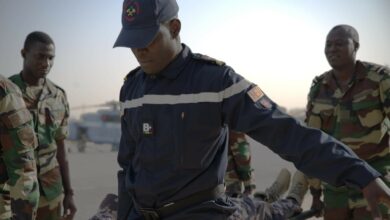 Senegal Air Force Medic carries a litter with a patient on it during an exercise scenario of Aeromedical Evacuation Team Phase V at Ouakam Air Base, Senegal, Jan. 24, 2024. The completion of Phase V of the AMET training signifies a remarkable journey for the Senegalese Air Force which has been actively involved in Aerial Patient Movement in collaboration with USAFE-AFAFRICA Surgeon General Office and Defense Institute for Military Operations since 2019. (U.S. Air Force photo by Dreshawn Murray)