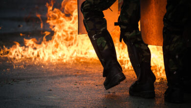 A unit of Moldavian soldiers push through a wall of fire Feb. 17 during fire-phobia training. As part of their pre-KFOR deployment, multinational and United States service members pass through the joint Multinational Readiness Center, where they must complete a rigorous series of training scenarios before moving on to the NATO KFOR operation. The KFOR MRE 21 is based on the current operational environment and is designed to prepare the unit for peace support, stability and contingency operations in Kosovo in support of civil authorities to maintain a safe and secure environment. (U.S. Army photo by Sgt. 1st Class Benjamin Cossel)