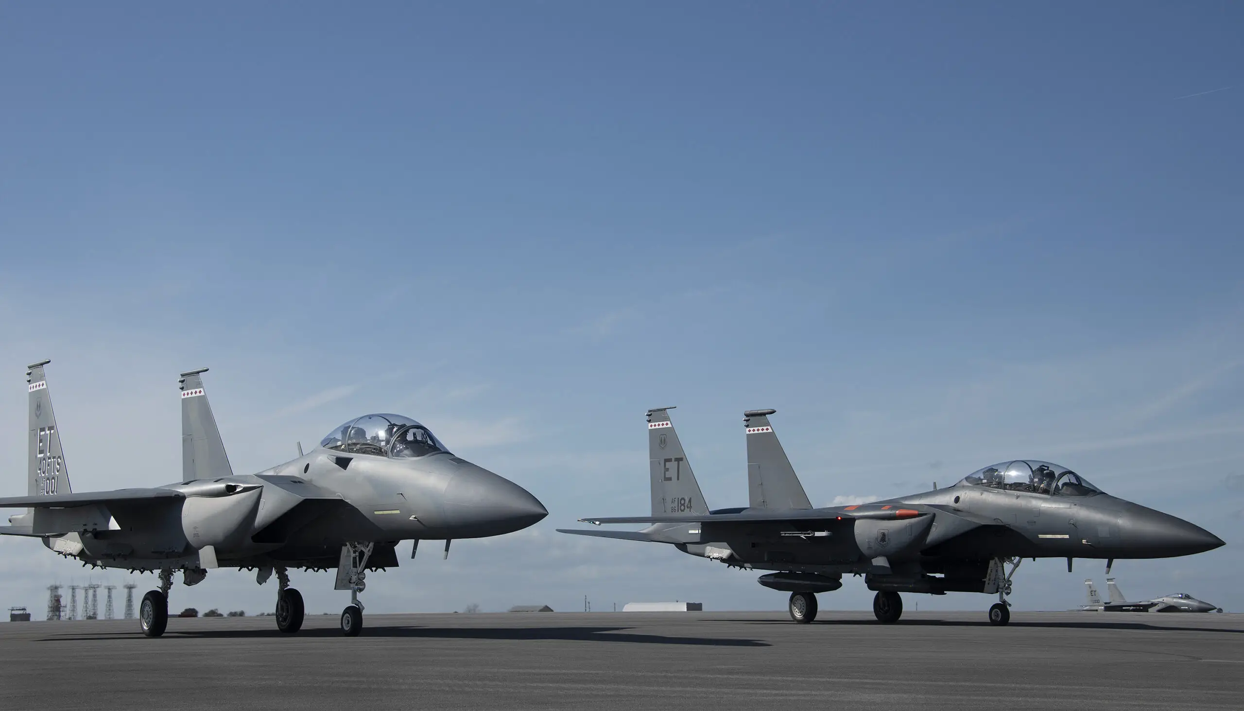The F-15EX, the Air Force’s newest fighter aircraft, is flanked by an F-15E and F-15C in the distance March 11 at Eglin Air Force Base, Fla. The aircraft will be the first Air Force aircraft to be tested and fielded from beginning to end through combined developmental and operational tests. The 40th Flight Test Squadron and the 85th Test and Evaluation Squadron personnel are responsible for testing the aircraft.