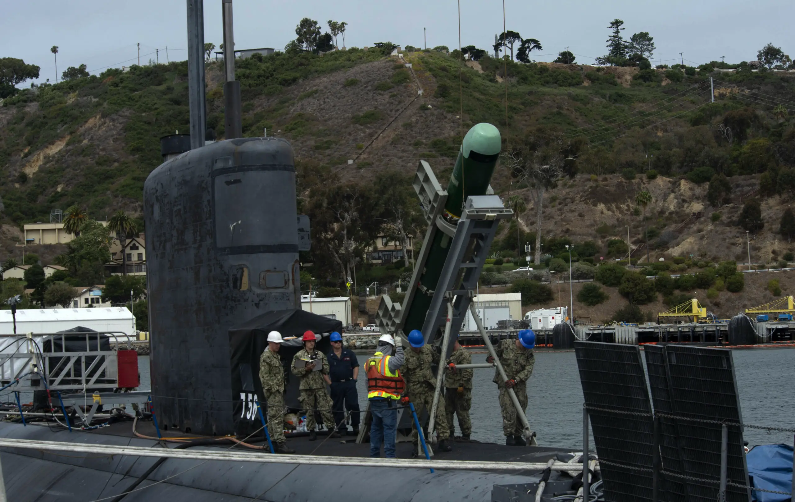210624-N-CT127-0050 SAN DIEGO (June 24, 2021)- Sailors load a Mk 48 advanced capability torpedo onto the Los Angeles-class fast-attack submarine USS Scranton (SSN 756), June 24. U.S. military forces are present and active in and around the Pacific in support of allies and partners and a free and open Indo-Pacific for more than 75 years. (U.S. Navy photo by Chief Mass Communication Specialist Josue L. Escobosa/Released)