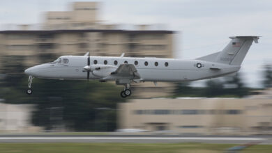 A C-12J Huron, assigned to the 459th Airlift Squadron, performs touch-and-go flight patterns June 14, 2016 at Yokota Air Base, Japan. The C-12J is a twin turboprop aircraft used for cargo and passenger airlift and aeromedical evacuations. (U.S. Air Force photo by Yasuo Osakabe/Released)