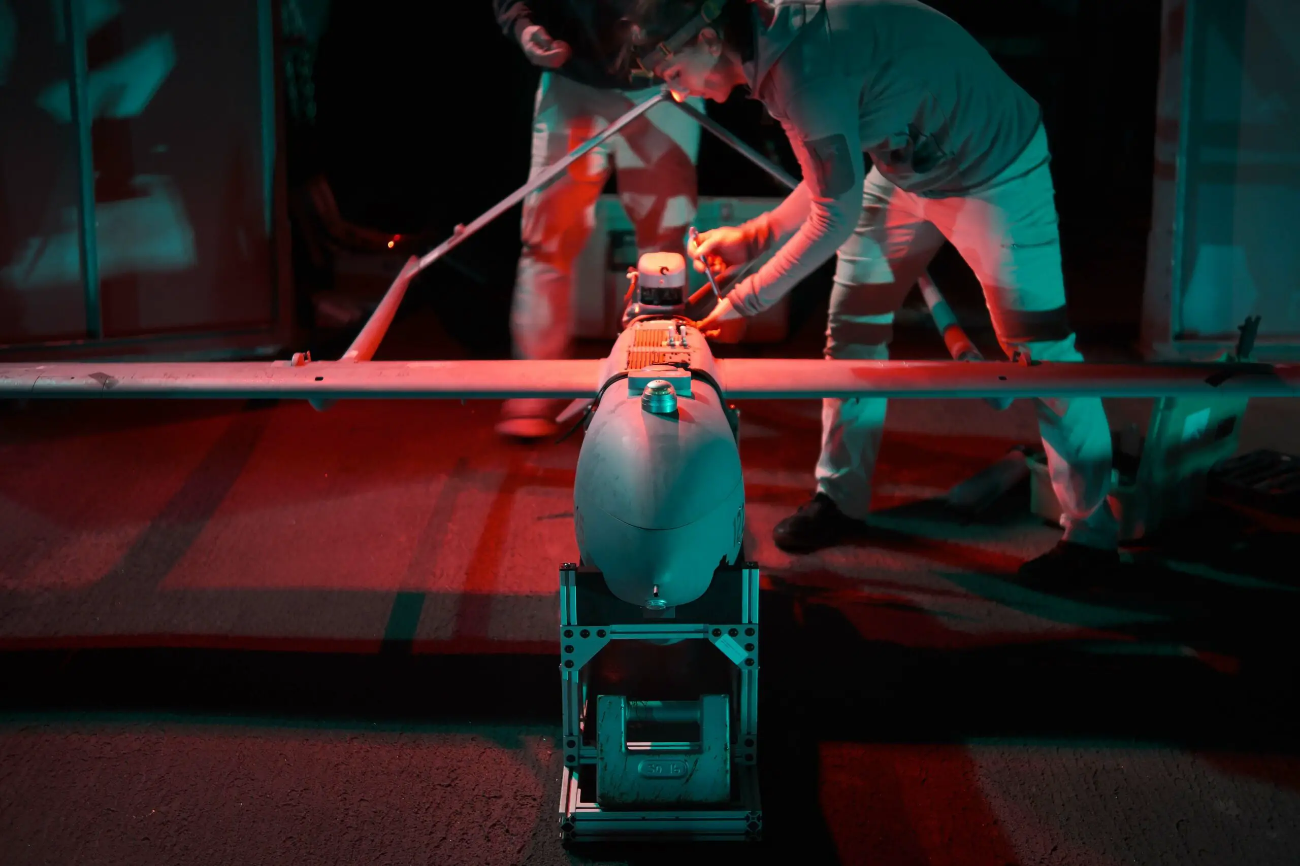 PHILIPPINE SEA (Nov. 20, 2022) – Aerosonde unmanned aerial vehicle (UAV) operators assigned to the Arleigh Burke-class guided-missile destroyer USS Milius (DDG 69) conduct post-flight checks on a UAV. Milius is assigned to Commander, Task Force 71/Destroyer Squadron (DESRON) 15, the Navy’s largest forward-deployed DESRON and the U.S. 7th Fleet’s principal surface force. (U.S. Navy photo by Sonar Technician Surface Second Class Lucas Daehan Yun)