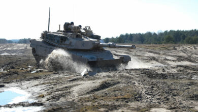 An M1A2 Abrams moves across the training area towards Buscierz Range at Drawsko Pomorskie, Poland, 2022