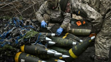 Ukrainian servicemen prepare to fire towards Russian positions with a 155mm M777 Howitzer artillery weapon on the front line somewhere near the city of Bakhmut