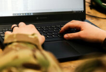 British soldier using a computer