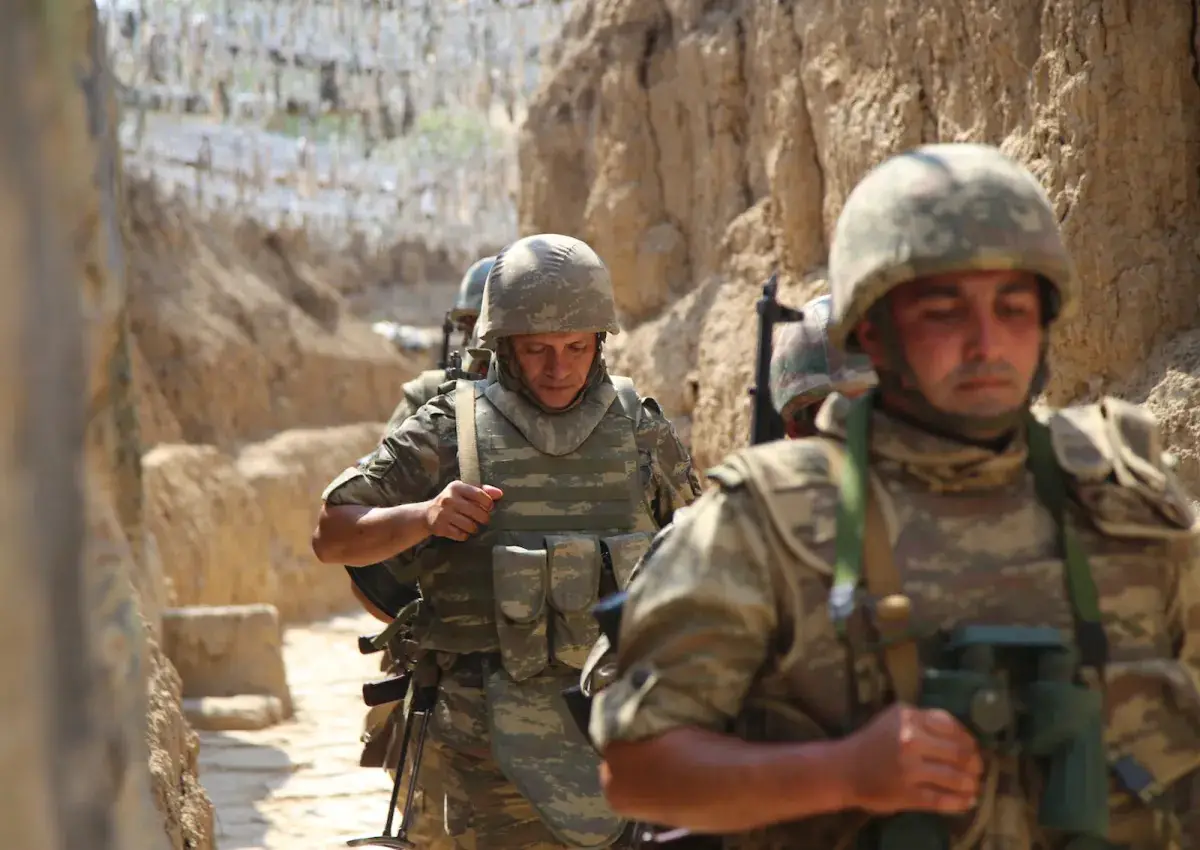 Azerbaijani soldiers patrol to respond to possible new attacks