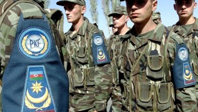Members of the Azerbaijan Army pass in review during CENTRASBAT (Central Asian Peacekeeping Battalion) 2000 opening ceremonies on September 13th, 2000.