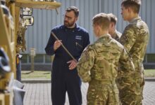 Instructor relays armored vehicle lessons to troops