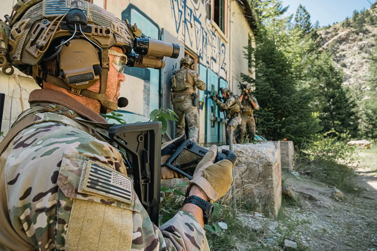 Soldier operating a robotic system controller