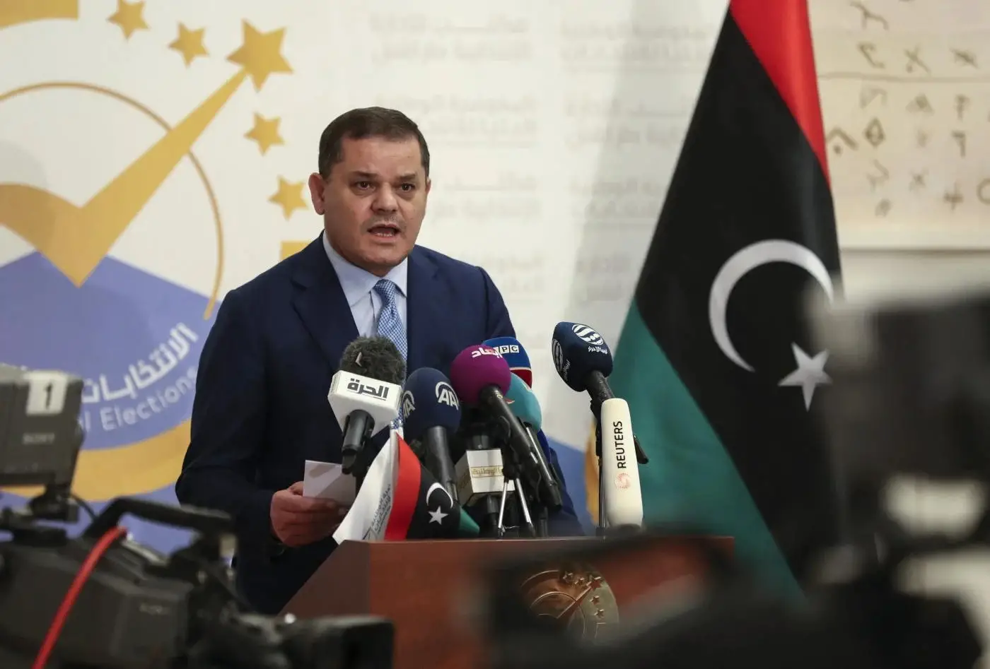 Libya's interim Prime Minister Abdul Hamid Dbeibah speaks at an event