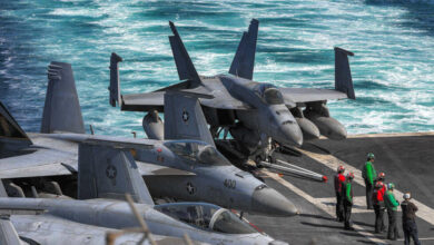 US Navy F/A-18 Hornet multirole combat aircraft on the deck of USS Dwight D. Eisenhower (CVN 69)