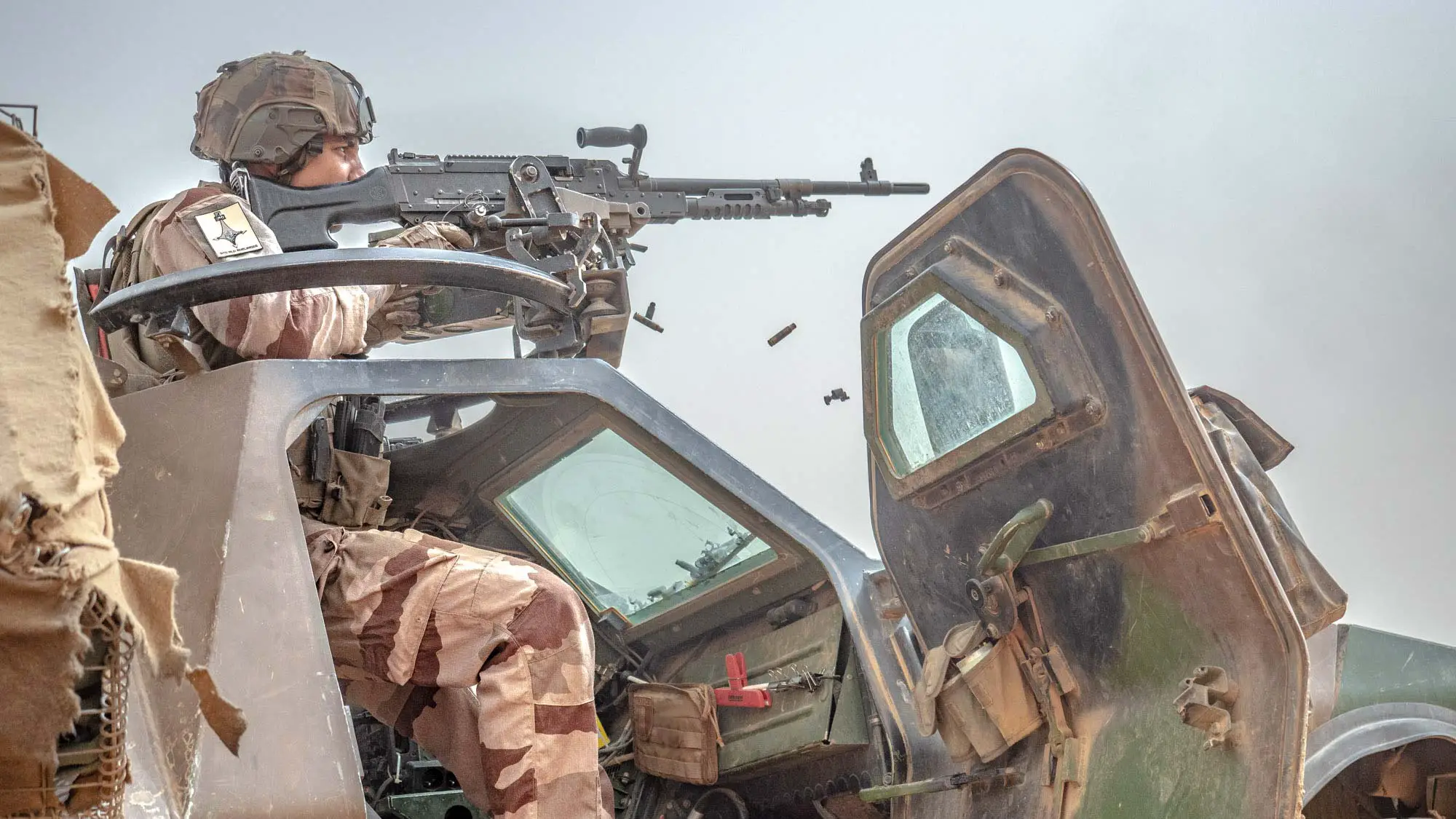 French soldier fires during Operation Aconit
