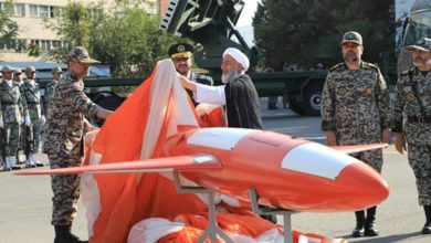 Brigadier-General Alireza Sabahifard, center, unveils the "Kian," a high-precision drone that can locate and attack targets far from the country's borders during a ceremony in the capital Tehran, September 2019.