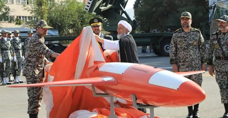 Brigadier-General Alireza Sabahifard, center, unveils the "Kian," a high-precision drone that can locate and attack targets far from the country's borders during a ceremony in the capital Tehran, September 2019.