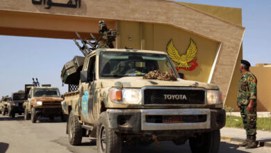 Members of the self-styled Libyan National Army gather in the eastern city of Benghazi