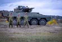 SGT Chris Hughes, LCPL Ben Crawford and TPR Liam Skinner supported testing of the Boxer Combat Reconnaissance Vehicle *** Local Caption *** Testing of the Boxer Combat Reconnaissance Vehicle was recently undertaken in Germany, by members of CASG Land Domain and 2/14 LHR (QMI). Tests included firing the MK30-2 cannon and MAG58 machine gun in extreme weather conditions, as well as testing the new programmable munitions capability. Three soldiers from 2/14 LHR (QMI) were involved in testing at the Rheinmetall site in Unterluss, Germany, where the vehicles Lance 2.0 turret was designed and initial production has commenced. The visit included a brief on the Block II vehicle design, operation of the Combat Intelligence, Surveillance and Reconnaissance system and new weapon control systems. Development of these systems included input from 2/14 LHR soldiers, leveraging their experience with the Block I vehicles.