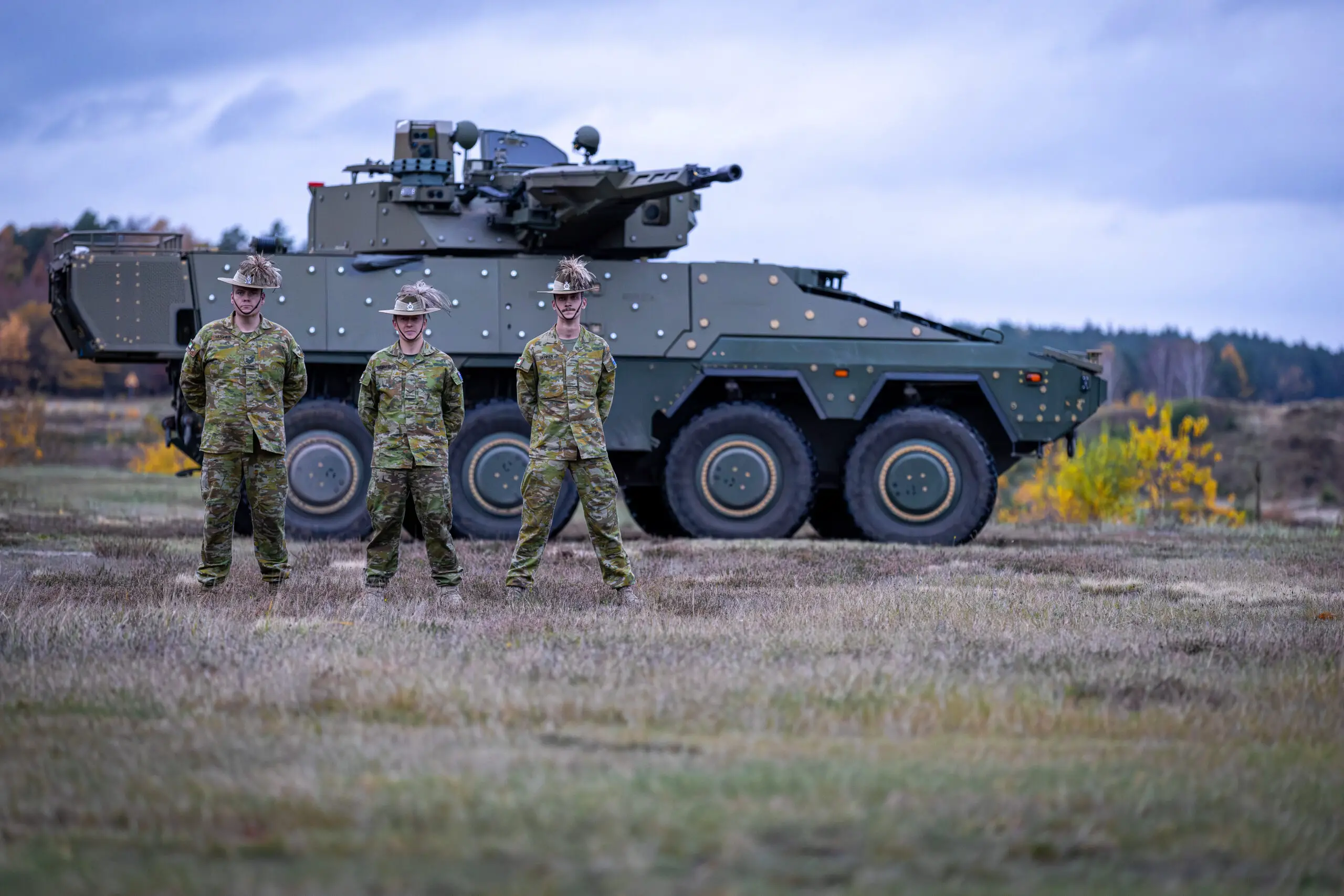 SGT Chris Hughes, LCPL Ben Crawford and TPR Liam Skinner supported testing of the Boxer Combat Reconnaissance Vehicle *** Local Caption *** Testing of the Boxer Combat Reconnaissance Vehicle was recently undertaken in Germany, by members of CASG Land Domain and 2/14 LHR (QMI). Tests included firing the MK30-2 cannon and MAG58 machine gun in extreme weather conditions, as well as testing the new programmable munitions capability. Three soldiers from 2/14 LHR (QMI) were involved in testing at the Rheinmetall site in Unterluss, Germany, where the vehicles Lance 2.0 turret was designed and initial production has commenced. The visit included a brief on the Block II vehicle design, operation of the Combat Intelligence, Surveillance and Reconnaissance system and new weapon control systems. Development of these systems included input from 2/14 LHR soldiers, leveraging their experience with the Block I vehicles.