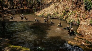 Members of the ethnic rebel group Ta'ang National Liberation Army (TNLA) take part in a training exercise