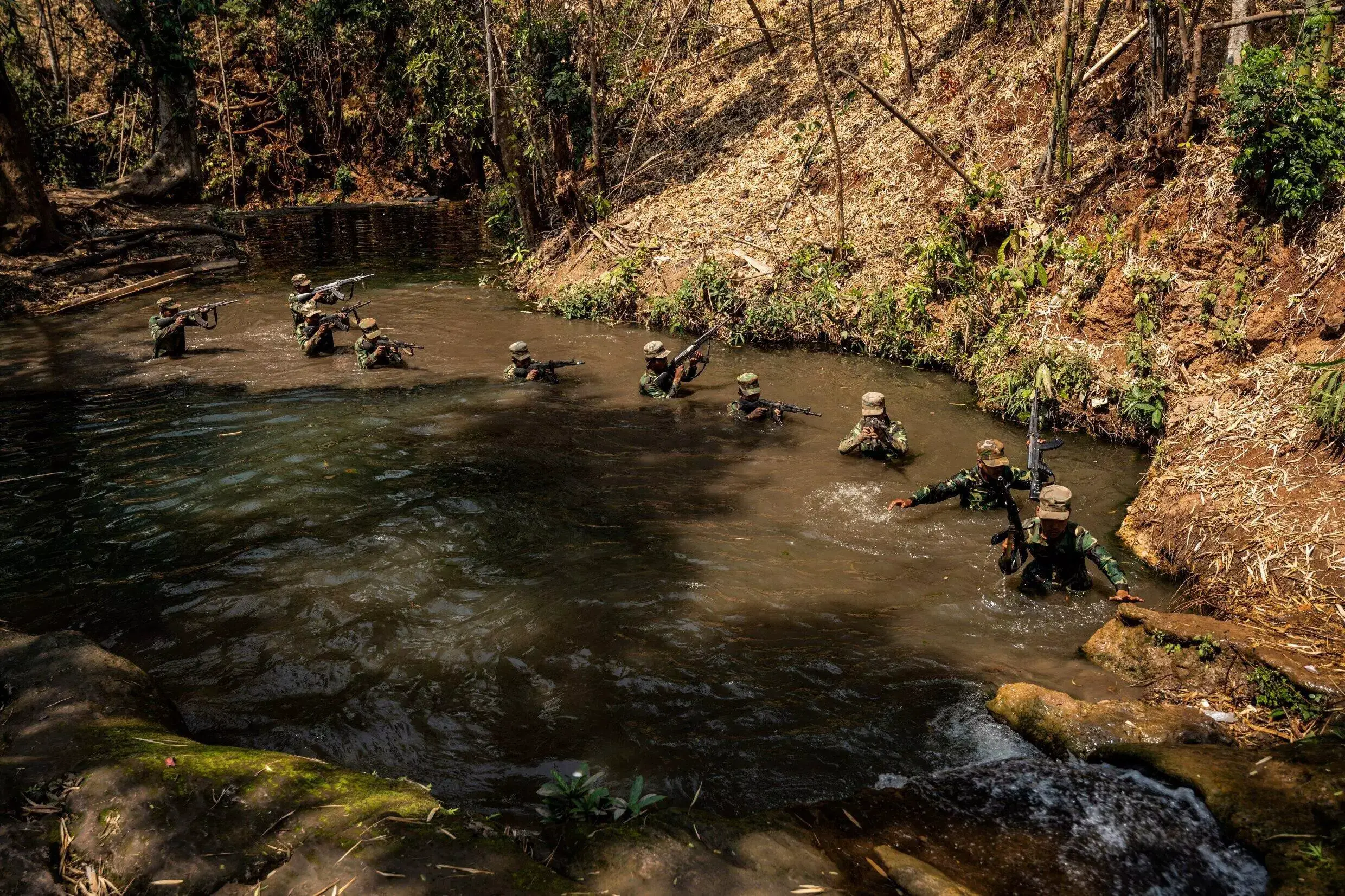 Members of the ethnic rebel group Ta'ang National Liberation Army (TNLA) take part in a training exercise