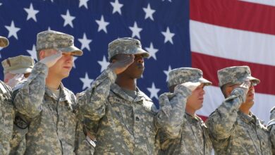 US Army soldiers honoring those that came before