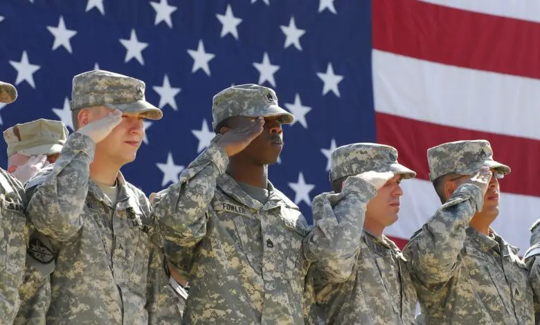 US Army soldiers honoring those that came before