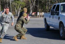 Preventive medicine technicians and a corpsman with Forward Deployable Preventative Medical Unit Six during a drill in Virginia