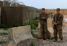 US soldiers stand at the Qayyarah Air Base, where US-led troops in 2017 helped Iraqis plan out the fight against the Islamic State in nearby Mosul