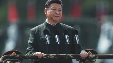 China's President Xi Jinping inspecting People's Liberation Army soldiers