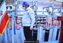 A handout picture provided by the Iranian presidential office on Saturday shows a video conference screen of an engineer inside Iran's Natanz uranium enrichment plant